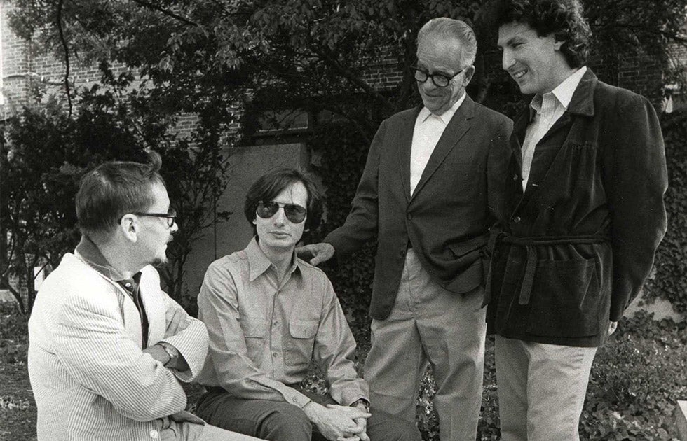 Charles Wright and Paul Messaris seated with Ray Birdwhistell and Steven Feld standing