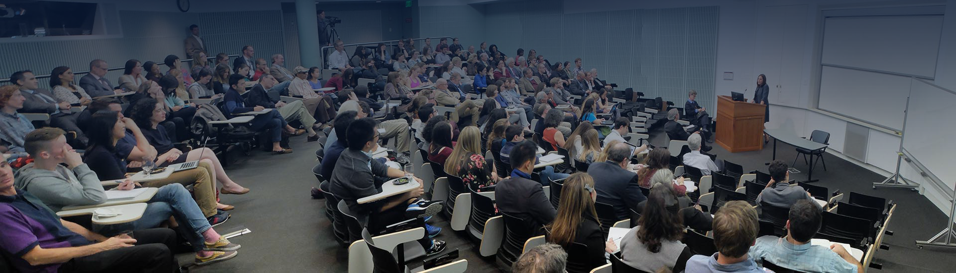 Group of people listening to a lecture