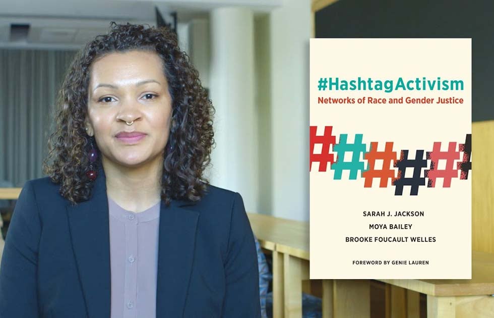 Sarah Jackson with a cover of her book, &quot;Hashtag Activism: Networks of Race and Gender Justice&quot;