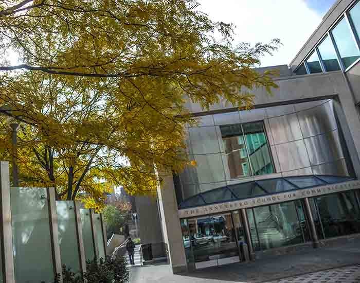 Annenberg School Walnut Street Exterior with fall leaves on tree