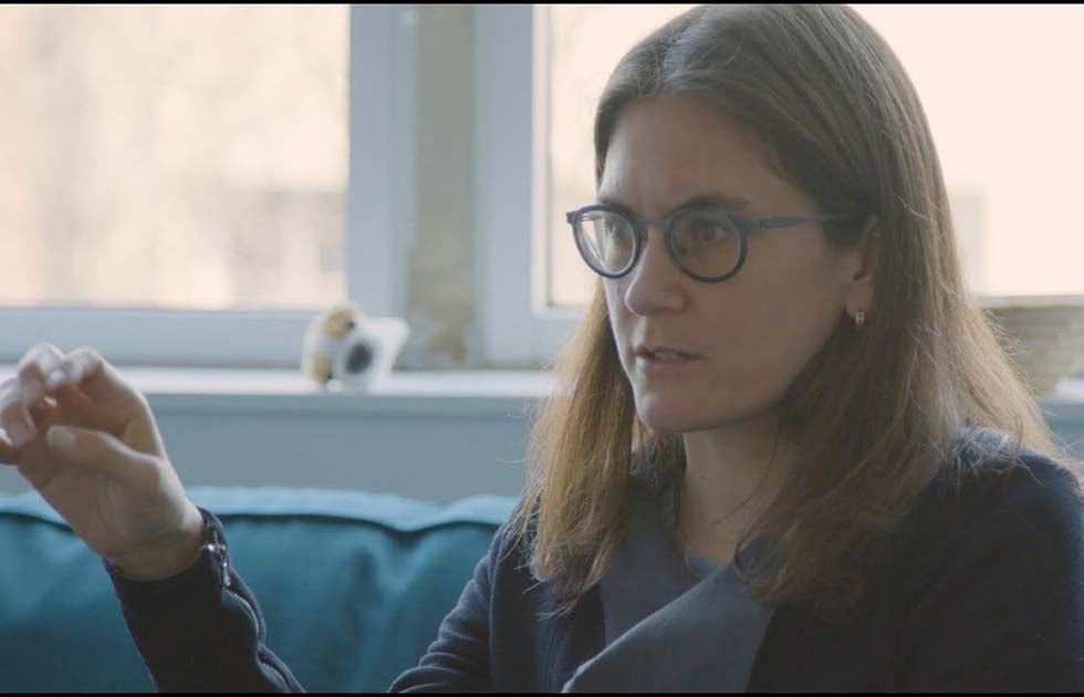 Video still of Emily Falk talking