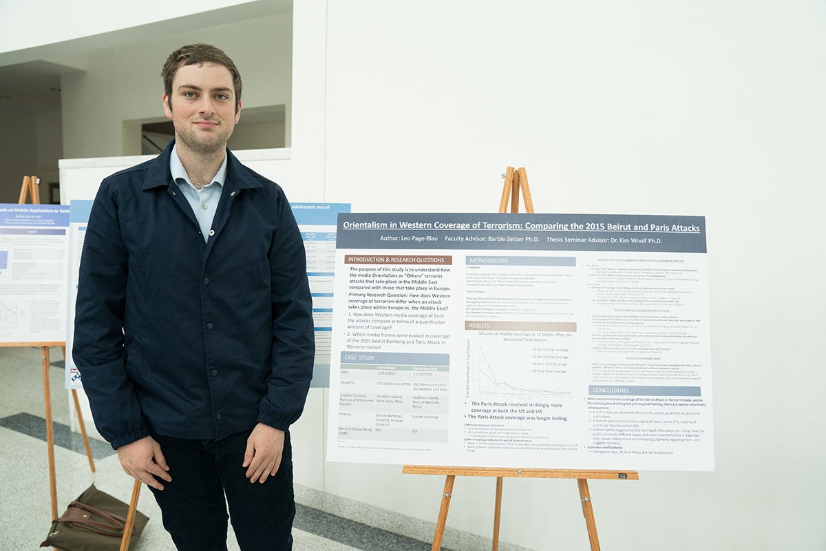 Leo Page-Blau poses with thesis poster.