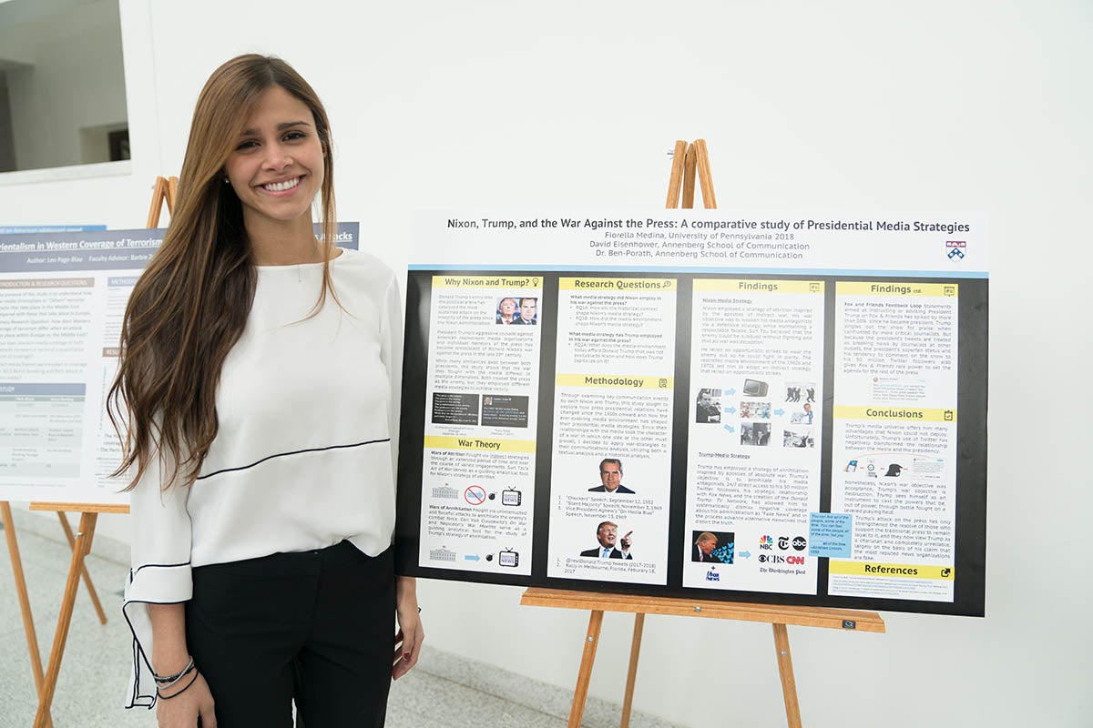 Fiorella Medina poses with thesis poster.