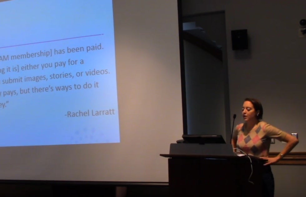 Jessa Lingel standing behind a podium at a talk
