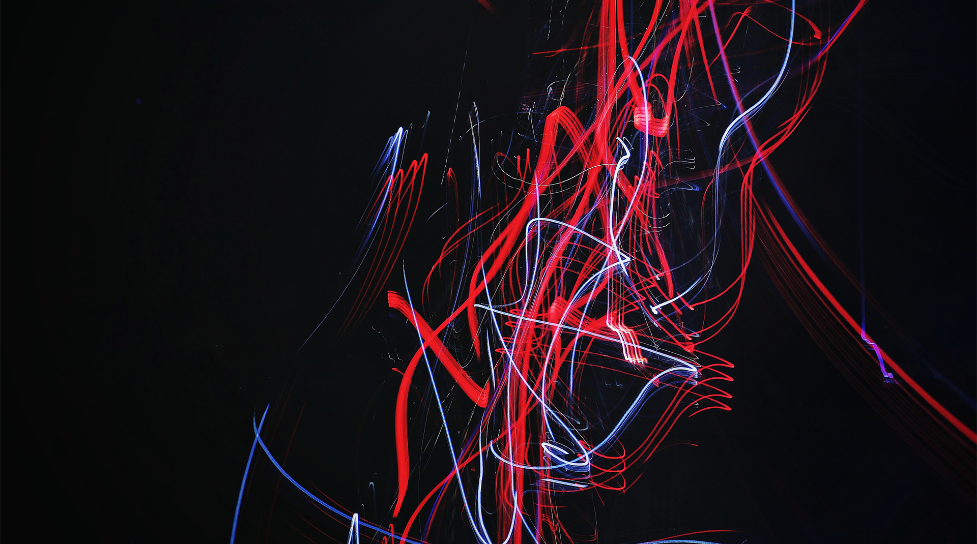 HSMTG_FW_1920x1070.png Abstract image of red and blue lights