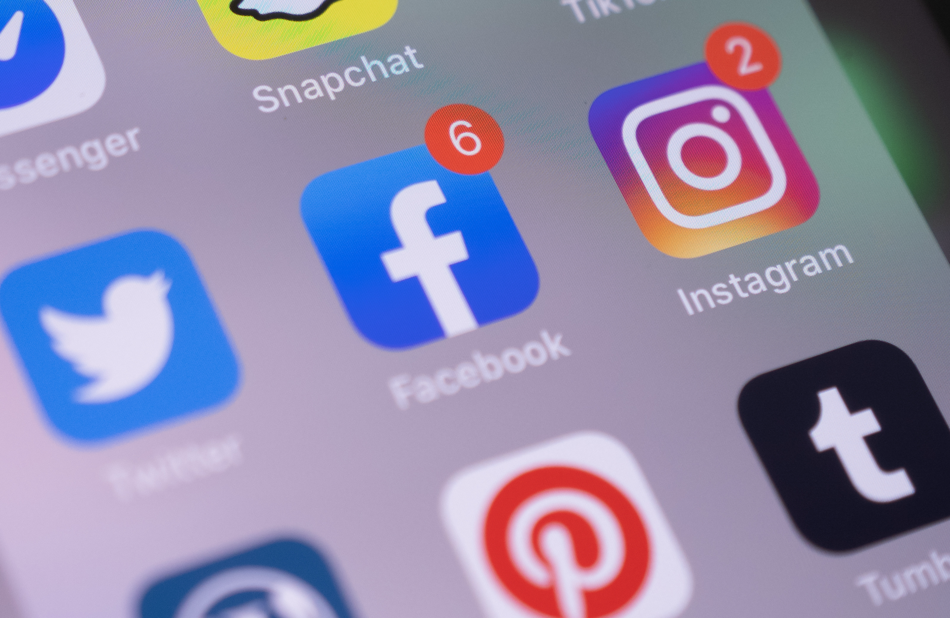facebook-header-1920.png Group of Social Media Application Icons on an iPhone screen