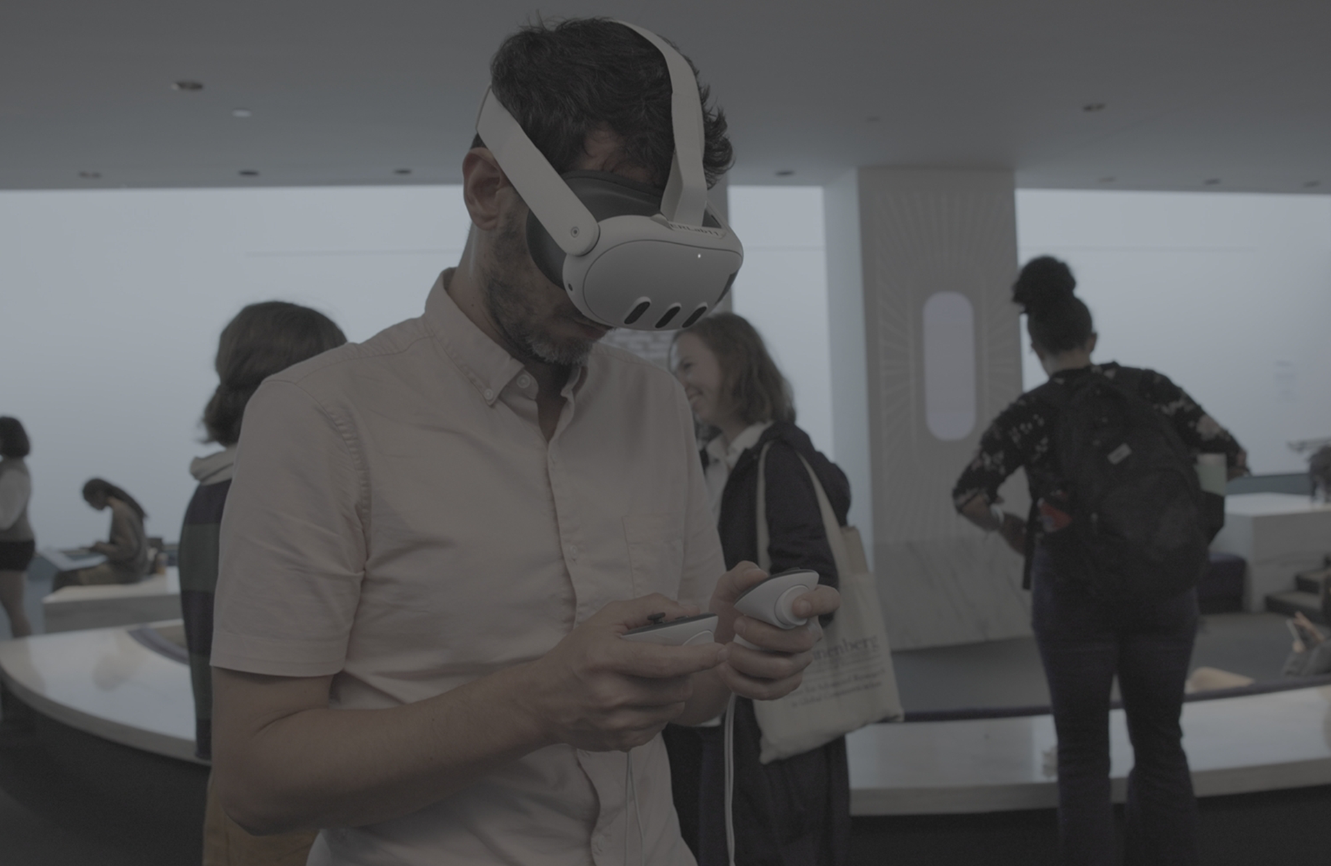 a person uses a VR headset at the opening of &quot;Degrees of Dis/embodiment&quot;