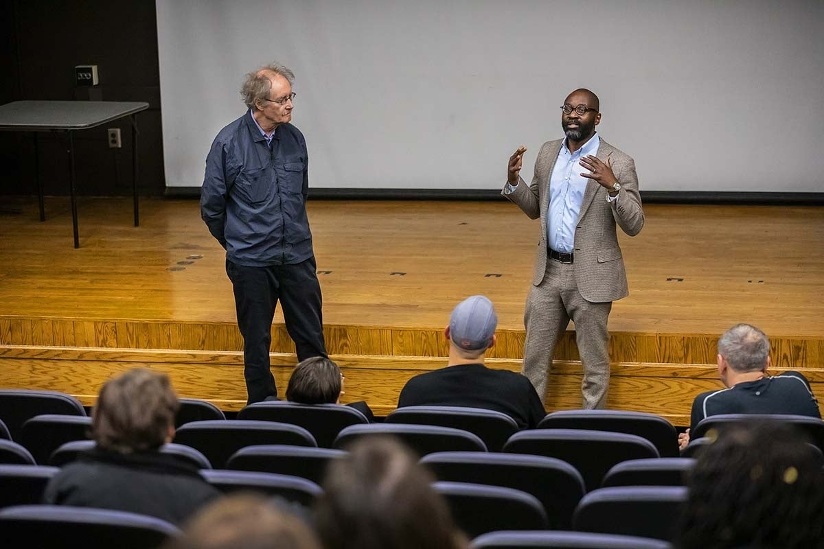 Photo of Dean John L. Jackson, Jr. and Thomas Lahusen speaking