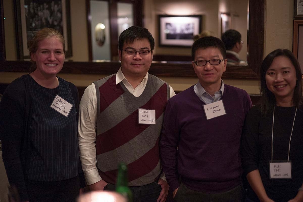 From left to right, Natalie Herbert, Sijia Yang, Xiaoquan Zhao, and Rui Shi smiling and posing for the picture together