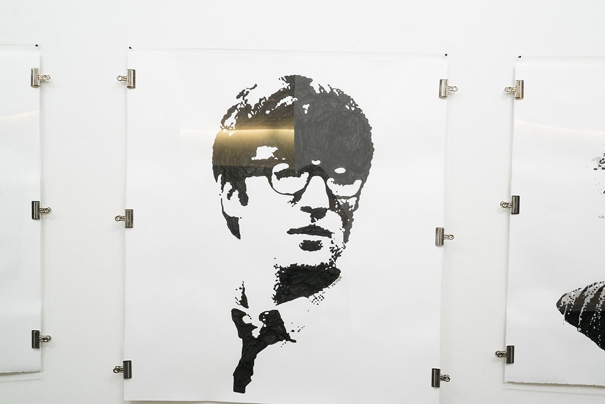 Ink drawing of musician John Lennon