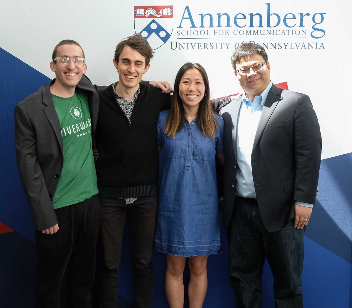 Joshua Becker, Guilbeault, Angela Won, and Sijia Yang pose for a photo at the Annenberg School Graduate Symposium