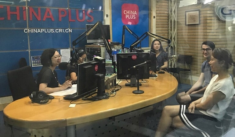 Karen Yang, Youlim Lee, and Nicholas Hunsicker on air with China Radio International