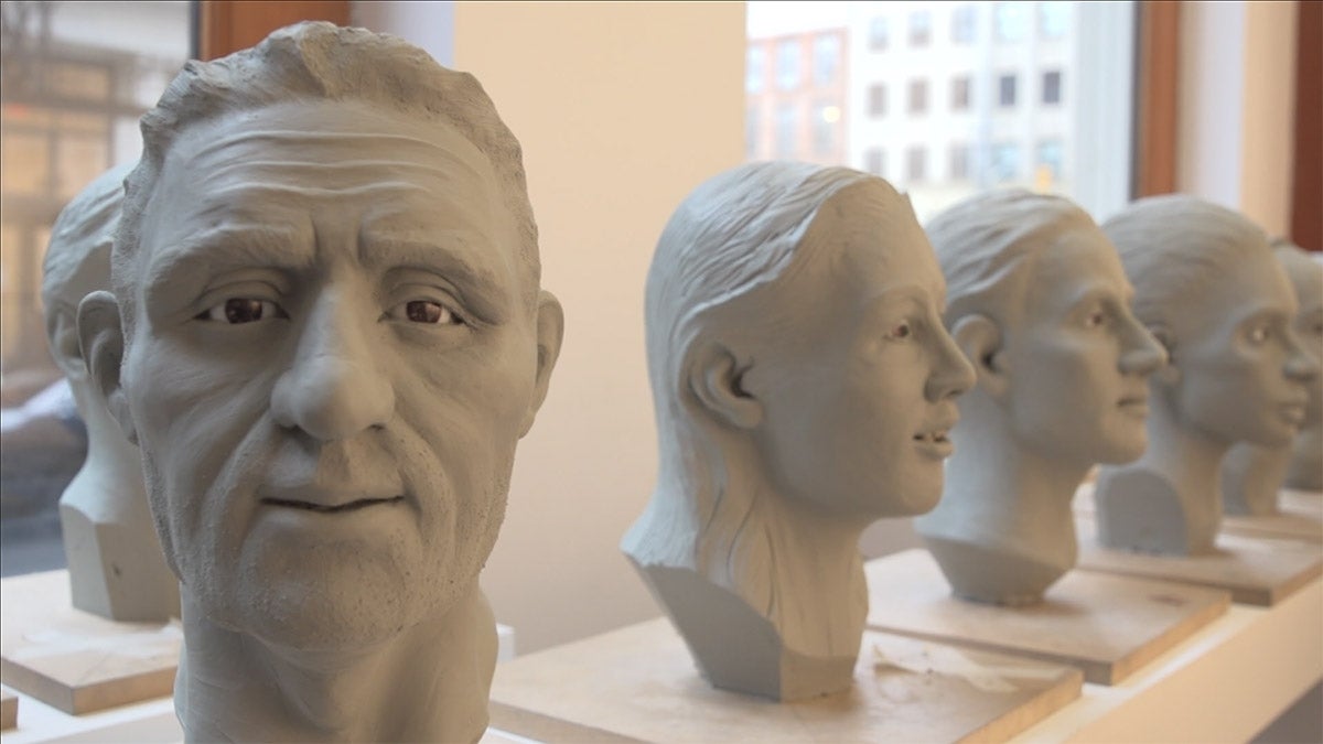Multiple neck-up clay art of victims of unnatural deaths