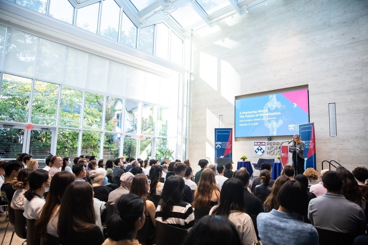 Penn President Liz Magill addresses an audience at Perry World House