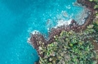 Aerial image of ocean and shore in the Carribean