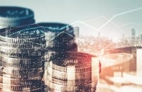 Abstract image with money, city skyline, and graphs