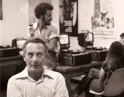 George Gerbner Photo.jpg George Gerbner seated in a room with people in the background