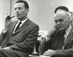 Gerbner and Seldes 700 x 550.jpg Black and white photo of George Gerbner smoking a pipe sitting next to Gilbert Seldes