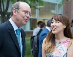 David Eisenhower and student 700 x 550.jpg David Eisenhower talking to a student while both are outdoors.