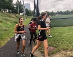 Running club 2 700 x 550.jpg People running around a ball field