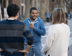 CB_Fellows_Compass.png Three students talking outdoors
