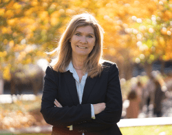 SBW.png Sarah Banet-Weiser standing outside on a fall day smiling at the camera with her arms crossed