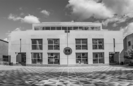 View of the Annenberg School building, in black and white, from Locust Walk