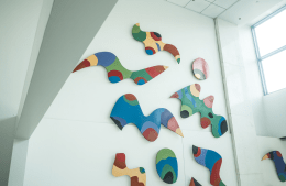 abstract art 1920x1250.png view of colorful abstract art on a white wall inside Annenberg building