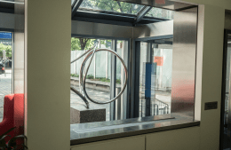 angled view of metal sculpture in Annenberg front lobby on a sunny day