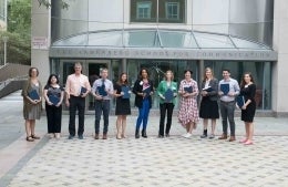 Photo of Annenberg alumni outside of Annenberg entrance