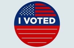 red, white, and blue "I Voted" sticker, photo credit @visuals / Unsplash