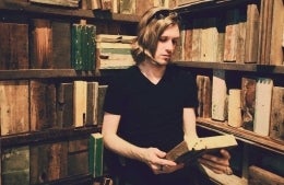 Eric Forbush reading a book