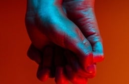 Two hands holding each other, photo credit ian dooley / Unsplash