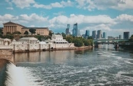 View of Philadelphia Skyline over river, photo credit Chris Murray / Unsplash