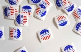 Photo of voting stickers; photo credit: Element5 Digital / Unsplash