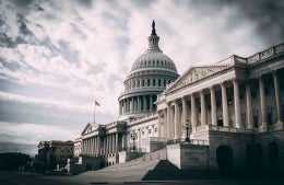 side photo of U.S. Capitol in Washington D.C.; photo credit: Harold Mendoza / Unsplash