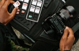 camera + hands credit Samsung Memory on Unsplash 1920x1250.jpg hands holding memory cards and a camera, photo credit Samsung Memory / Unsplash
