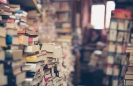 stacks of books; Photo by Eli Francis on Unsplash