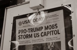 grayscale newspaper in machine credit little plant on Unsplash 1920x1250.jpg USAToday Newspaper with header "Pro-Trump Mobs Storm US Capitol" in a machine, photo credit little plant/Unsplash