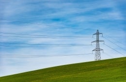 electric tower on a hill, photo credit Thomas Despeyroux / Unsplash