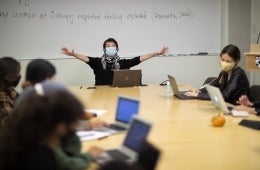 Jessa Lingel.jpeg Professor Jessa Lingel teaching in a classroom with mask on