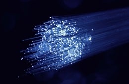 Lit fibers Unsplash Denny Muller 1920 x 1250 .jpg Group of clear fibers lit by blue light on a black background, credit Denny Müeller, Unsplash