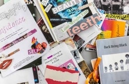 gender_media_zines.jpg A pile of zines read things like, "uneven skin...," "lose weight fast," and "I'm not going to change my mind."