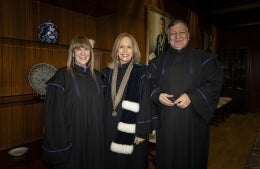 Barbie Zelizer, Isabel Capeloa Gil, and José Manuel Barroso stand in academic regalia