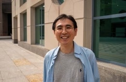 Se-Hoon Jeong standing outside the Locust Walk-side facade of the Annenberg building