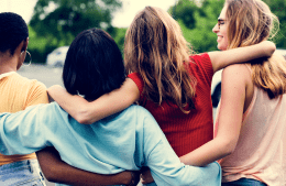 Rear view of a group of young women walking together