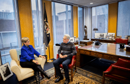 Kathleen Hall Jamieson and Eugene Kiely sit in Jamieson's office