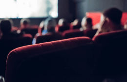 people watching a movie in a movie theater