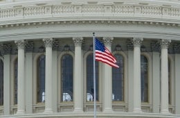 PRL.jpg American flag flying in front of US Capitol building rotunda, Photo Credit: Adam Szuscik / Unsplash