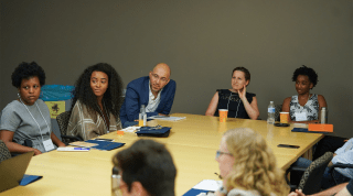 CARGC members during a discussion at a conference table